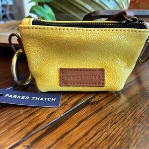 Parker Thatch Baby Buddy coin purse. NWT, brass attachment ring. Bright yellow.